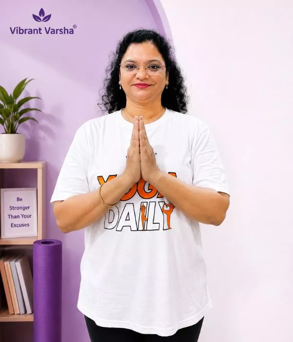 Online Yoga for Weight Management | Vibrant Varsha 2 - VIBRANT VARSHA Varsha Mam demonstrating online yoga for weight management support